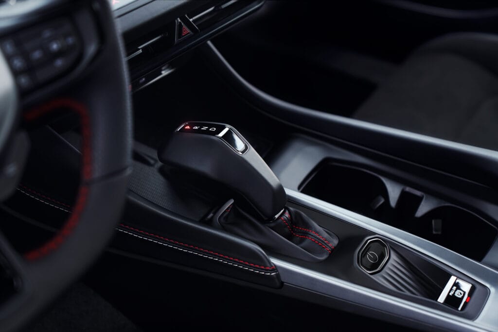 An all-new, modern "pistol-grip" shifter and the start/power but